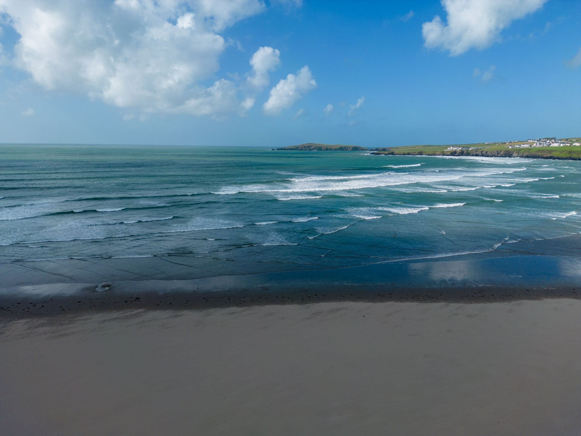 Aerial view of the West Wales coast — where Storm Development builds software locally